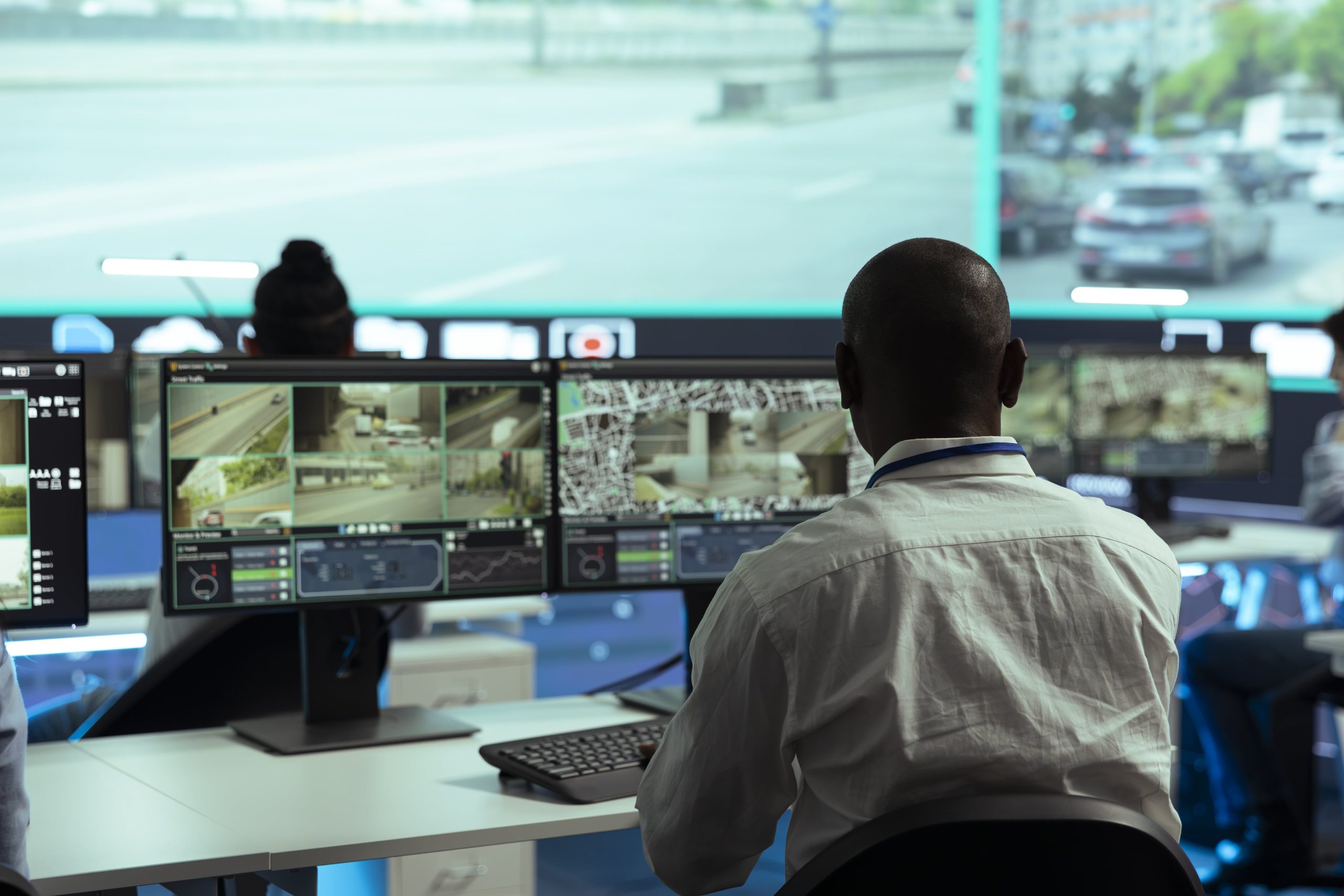 observation-room-employee-reviewing-video-surveill-2024-06-14-04-05-59-utc-min-scaled-1